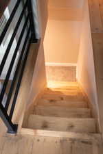 Stairway with wood finished floors
