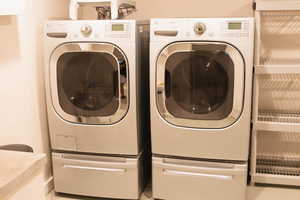 Washroom with washing machine and dryer