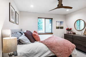 Bedroom featuring recessed lighting and a ceiling fan