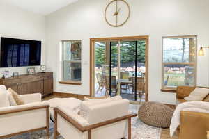 Living room featuring wood finished floors and baseboards