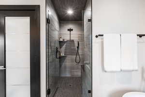 Full bath featuring a stall shower