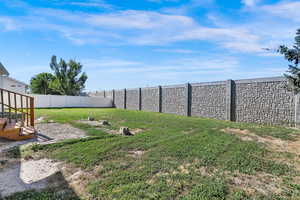 View of fenced backyard