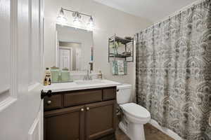 Bathroom with vanity and toilet