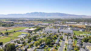 Aerial view of residential area featuring mountains