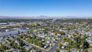 Aerial overview of property's location featuring nearby suburban area