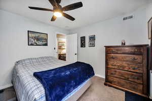Bedroom featuring carpet flooring and a ceiling fan