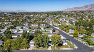 Aerial perspective of suburban area featuring a mountainous background