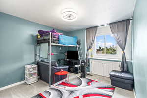Bedroom featuring carpet floors