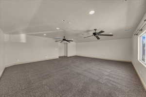 Spare room featuring light colored carpet, recessed lighting, and a ceiling fan