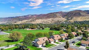 Aerial view of residential area with a mountain backdrop