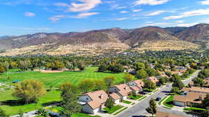 Aerial perspective of suburban area featuring mountains