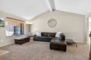 Living area with light carpet