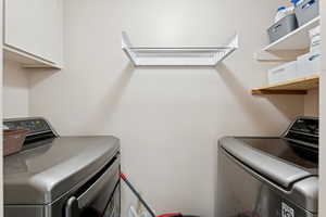 Laundry area featuring washing machine and dryer