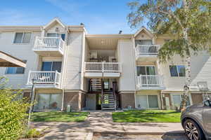View of property with stairway