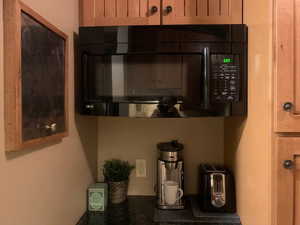 Kitchen view of black microwave