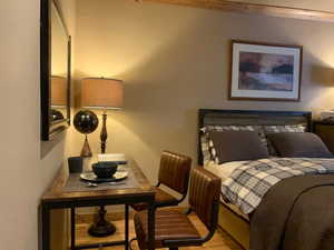 Bedroom with wood finished floors