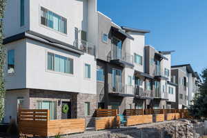 View of property with a residential view and a fenced front yard