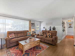 Living area featuring hardwood / wood-style floors
