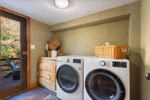 laundry is on the main floor, and exits to one of the decks