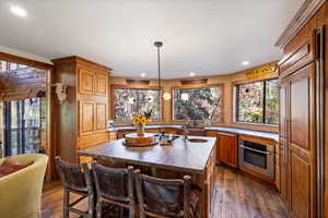 Kitchen features a Sub Zero refrigerator, down draft stove, and Bosch oven.