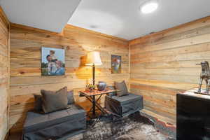 Living area with wooden walls