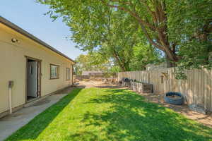 View of fenced backyard
