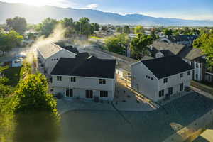 Aerial perspective of suburban area featuring mountains