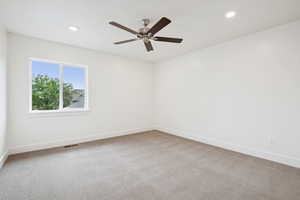 Unfurnished room featuring light carpet, recessed lighting, and ceiling fan