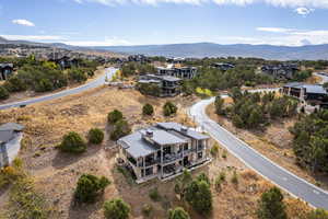 Aerial view of residential area featuring mountains
