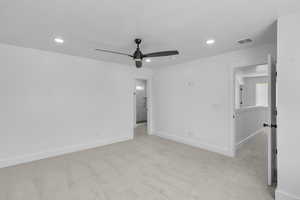 Unfurnished bedroom with light carpet, recessed lighting, a textured ceiling, and a ceiling fan