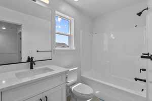 Full bathroom with shower / bathtub combination and vanity
