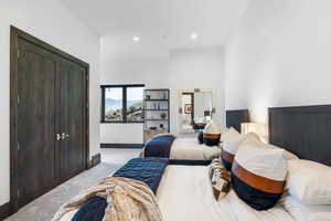 Bedroom featuring carpet, recessed lighting, and a mountain view