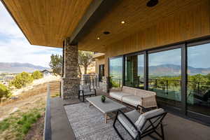 View of patio / terrace featuring a mountain view and outdoor lounge area