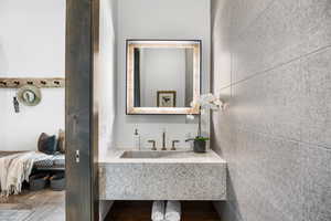 Half bathroom featuring vanity