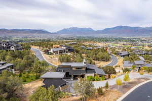 Aerial perspective of suburban area featuring mountains