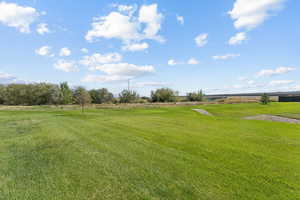 View of grassy yard featuring a rural view