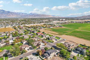View of property location featuring a mountain backdrop and nearby suburban area