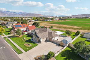 Aerial view of sparsely populated area with a mountain backdrop