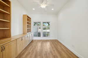 Unfurnished room featuring light wood finished floors, recessed lighting, and a ceiling fan