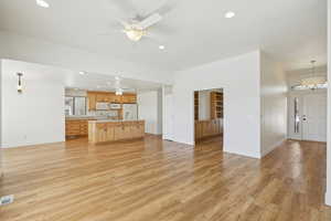 Unfurnished living room featuring recessed lighting and light wood-style floors