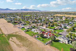 Aerial view of residential area with a mountainous background
