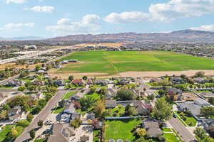 Aerial view of residential area featuring a mountain backdrop