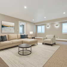 Living room featuring carpet floors and recessed lighting