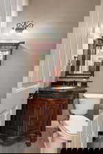 Bathroom with vanity and light tile patterned floors