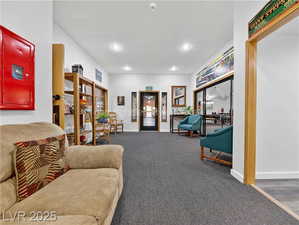 Sitting room featuring carpet and recessed lighting