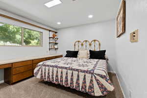 Bedroom featuring light colored carpet and recessed lighting