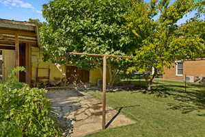 View of yard with a patio area