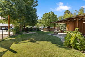 Fenced backyard featuring a patio area