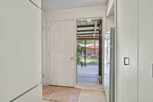 Foyer with light carpet