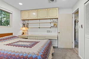 Bedroom with carpet flooring and recessed lighting